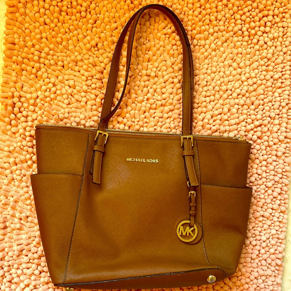 Medium sized brown Michael Kors purse